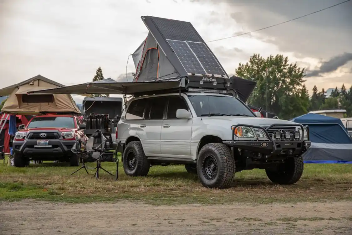 Toyo Tires Trailpass: white Lexus LX470 with Alu-Cab rooftop tent