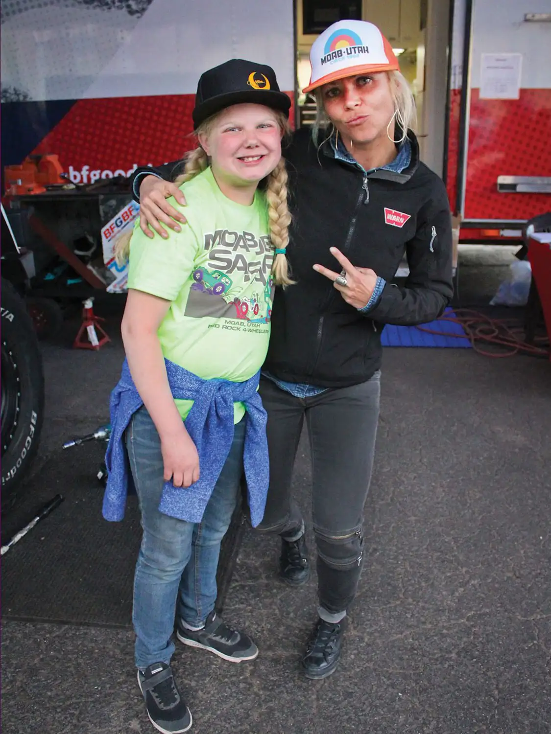 Jessi Combs poses with young girl