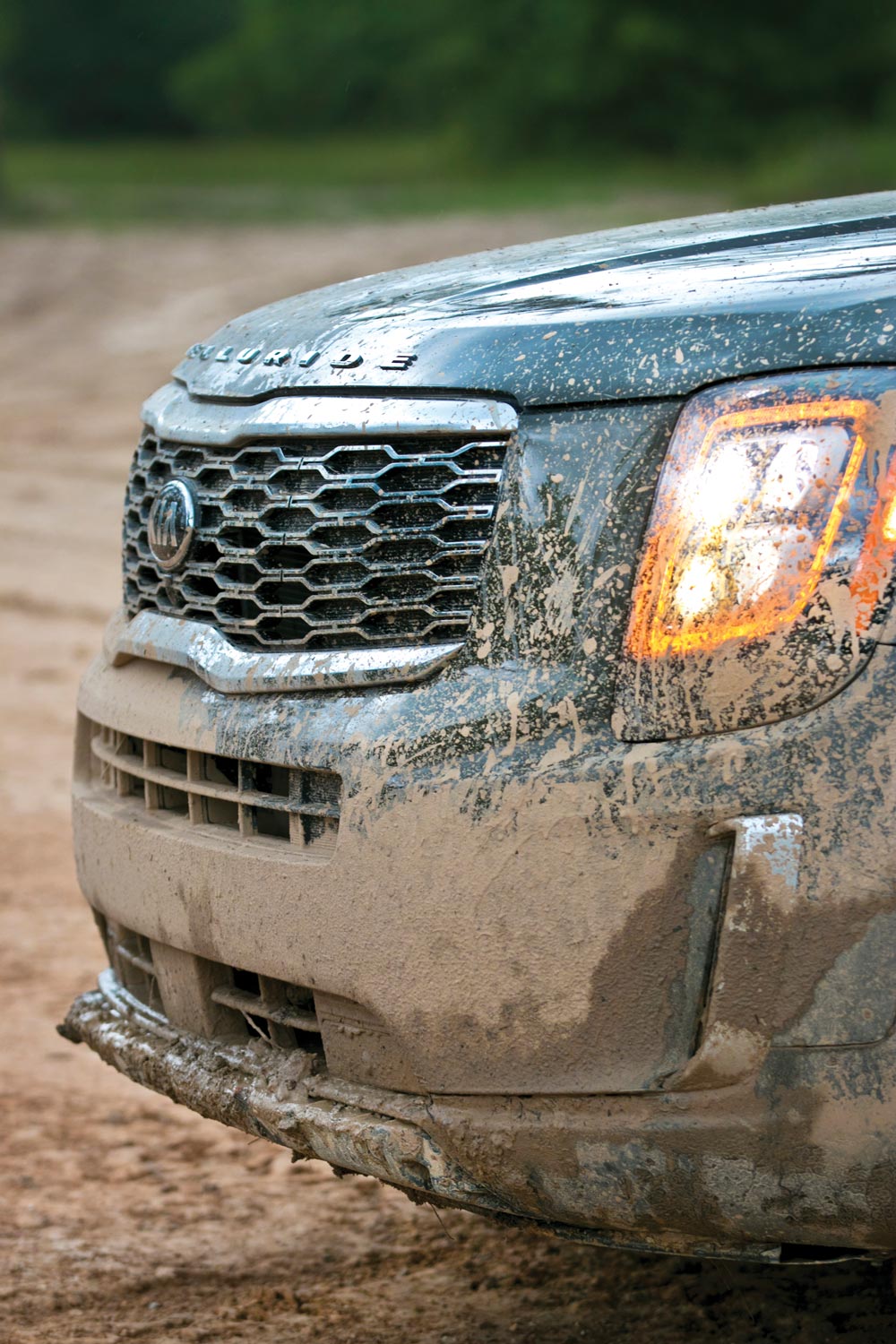 muddy front bumper and grille