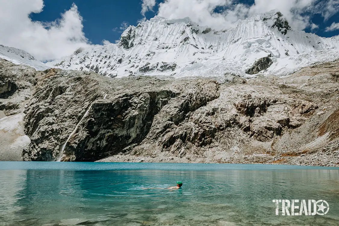 Swimming in the glacial waters of Laguna 69