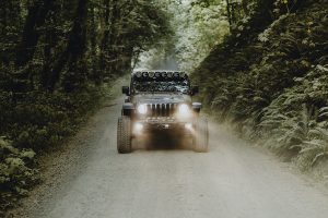 Jeep with headlights and fog lights on