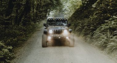 Jeep with headlights and fog lights on