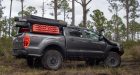 Ford Ranger with Black Rhino wheels and bed storage with Maxtrax mounted to the side.