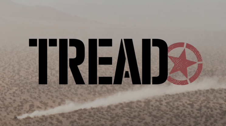 The TREAD logo superimposed atop a truck kicking up dust at King of the hammers 2023