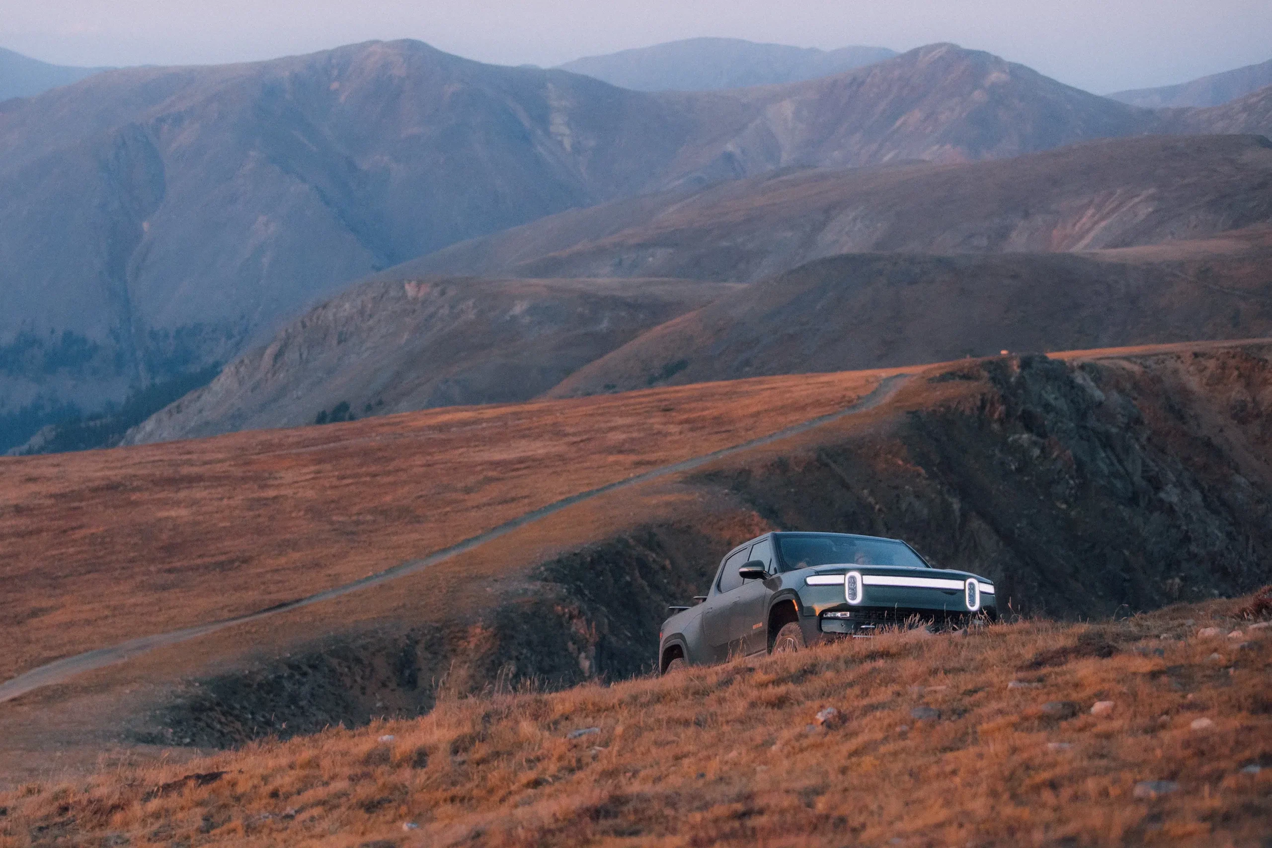 Rivian RIT is an EV for overlanding that easily tackles hilly terrain.